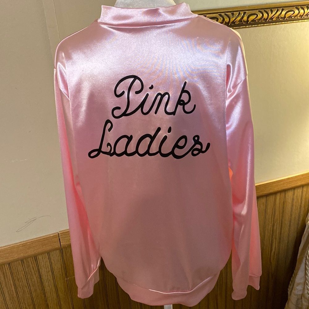 The pink ladies Barbie pink lightweight jacket. Size medium